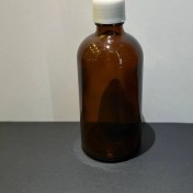 تصویر شیشه قهوه‌ای 100 میل همراه با قطره چکان سفید 