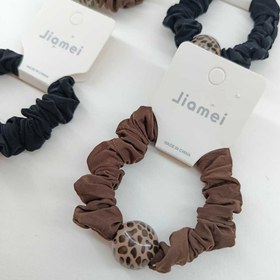 تصویر کش موی زنانه مهره دار 