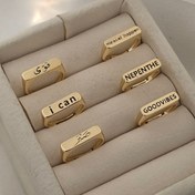 تصویر انگشتر استیل تکست با حکاکی کلمه قوی 