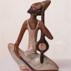 تصویر مجسمه کمانچه نواز 