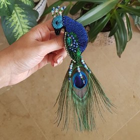تصویر سنجاق سینه طاووس 