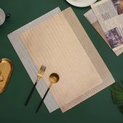 تصویر زیر بشقابی مستطیل طرحدار طلایی و نقره ای 