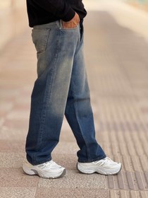 تصویر شلوار جین نیم بگ سورمه‌ای شست مردانه - ۳۶ 