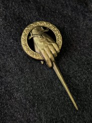 تصویر سنجاق سینه دست پادشاه 