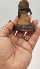 تصویر مجسمه چوبی نقوش تخت جمشید 