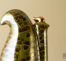 تصویر تندیس سرامیکی مرغ هما لعاب ترکدار سبز سدری