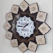 تصویر ساعت دیواری طرح مذهبی مدل تبسم تبسم کرم روشن