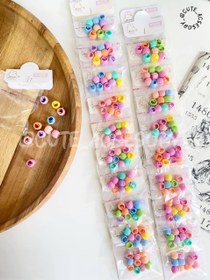 تصویر مهره مو پلاستیکی 