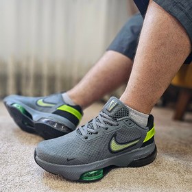 تصویر کفش کتونی مردانه نایک رنگ خاکستری تیره Nike 704 DG 