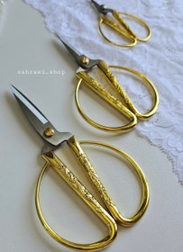 تصویر قیچی آنتیک سرنخ زن 