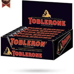 تصویر شکلات تلخ تابلرون همراه با عسل و مغز بادام باکس 20 عددی – Toblerone swiss Dark chocolate with honey & almond noucat 
