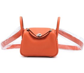 تصویر کیف دستی و دوشی زنانه چرمی نارنجی مدل شیک روزمره با بند قابل تنظیم Hermes