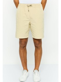 تصویر شلوارک مردانه ساده با بند کشی، رنگ قهوه‌ای روشن برند quiksilver Men Drawstring Solid Basic Short, Tan