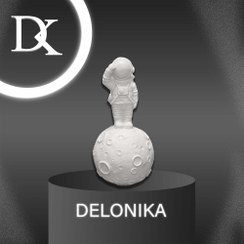 تصویر مجسمه فضانورد و ماه 