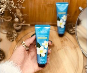 تصویر کرم نرم کننده دست خوشبو بابونه ZHIDOU mastiff flower soft elastic hand cream