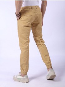 تصویر شلوار جین مردانه کژوال باریک فیت رنگ بژ برند the indian garage co Beige Men Slim Fit Casual Solid Regular Joggers