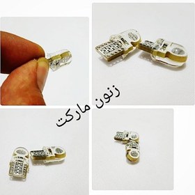 تصویر سکن (چراغ شب) و روپلاک سفید 