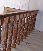 تصویر پایه نرده چوبی راه پله خراطی رنگ شده سوراخدار ( میلترانسخور ) کد kh27 The base of the wooden railing of the staircase is painted and perforated (Miltranskhor), code kh27