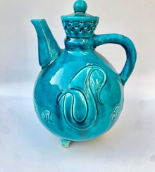 تصویر قوری یا آبریز صنایع دستی با نقوش برجسته تک نسخه کلکسیونی Iranian turquoise ceramic handicrafts