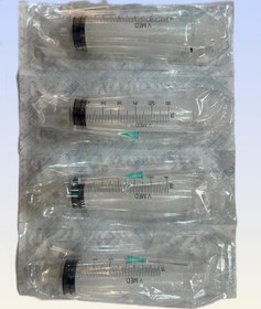 تصویر سرنگ 60 سی سی و گاواژ 