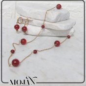 تصویر گردنبند استیل رو لباسی بلند با سنگ عقیق قرمز کد 1102 