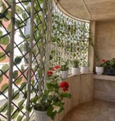 تصویر فنس آکاردئونی سبز 