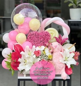 تصویر دسته گل و کیک برای زایمان نوزاد دختر 