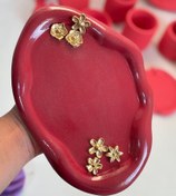 تصویر استند اکسسوری و آرایشی مدل سینی دفرمه شیپ عکاسی 