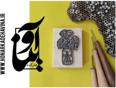 تصویر Price and online purchase of handmade linoleum stamp with a wooden base in the shape of a fig leaf plant 