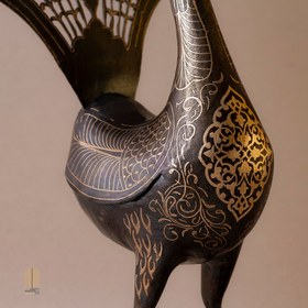 تصویر تندیس فلزی طاووس بدنه فولادی نقره کوبی شده (هنر کوفته گری)