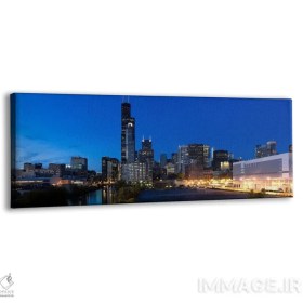 تصویر تابلو دکوراتیو Chicago, Illinois, USA,ساختمان ها در شهر روشن هنگام غرو… اثر پانورامیک ایمجز - بوم گالری ایماژ / 120x40 / بوم کلاف‌شده Buildings in a city lit up at dusk BY Panoramic Images