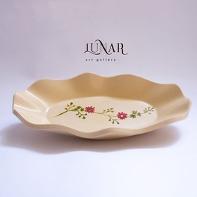 تصویر بشقاب بیضی دفرمه بتنی 