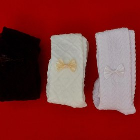 تصویر جوراب شلواری نوزادی در سه رنگ جذاب سفید ، شیری و مشکی طرح پاپیون 