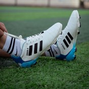 تصویر کفش فوتبال آدیداس مدل تونی کروس رنگ مشکی آبی استوک دار 
