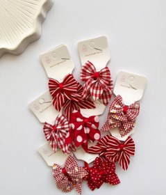 تصویر کش موی پاپیون قرمز 