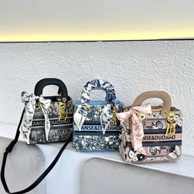 تصویر کیف مجلسی طرح دار 