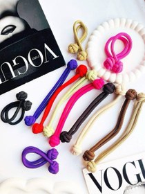 تصویر کش مو گره ای - قرمز 