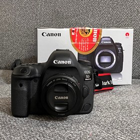 تصویر دوربین دیجیتال کانن مدل EOS 5D Mark IV به همراه لنز کانن مدل EF 50mm f/1.8 STM(کارکرده 18 هزارشات) 