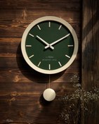 تصویر ساعت دیواری پاندول گرد - کرم یشمی 