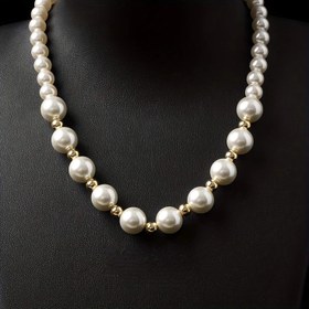 تصویر گردنبند مروارید و طلا 