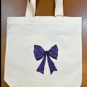 تصویر توتبگ پاپیون پلنگی 