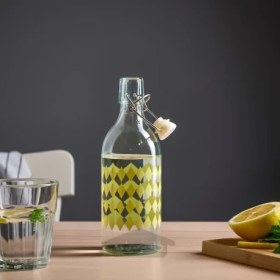 تصویر بطری با درپوش شیشه شفاف/ زرد روشن 0.5 لیتری ایکیا مدل IKEA KORKEN IKEA KORKEN Bottle with stopper clear glass/patterned light yellow 0.5 l