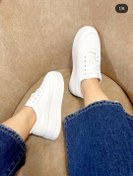 تصویر کتونی لژدار ونس بندی لژدار دخترانه و زنانه سفید و مشکی سبک و طبی و راحت 