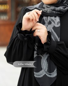 تصویر مانتو عبایی رخسانه ساده مشکی کد ۱۴۰۱۹ 