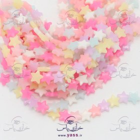 تصویر مروارید پاستیلی رنگارنگ طرح ستاره براق 