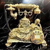 تصویر تلفن رومیزی برنزی سلطنتی در طرح بانو طلایی رنگ 