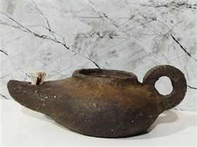 تصویر پیسوز قدیمی سرامیکی 