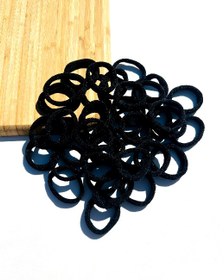 تصویر کش مو حوله ای مشکی 