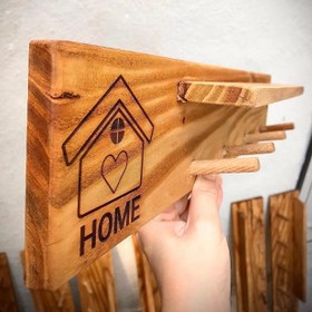 تصویر شلف چوبی طاقچه دار 