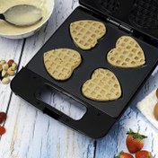 تصویر وافل ساز 4 تایی قلبی شکل جیپاس مدل GWM36543 Geepas Heart Waffle Maker, 4 Slice Capacity, Gwm36543 Non Stick Cooking Plate Cool Touch Handle &amp; Skid Resistance Feet Overheat Protection Power &amp; Ready Indication Lights, Black Roll over image to zoom in Geepas Heart Waffle Maker, 4 Slice Capacity, Gwm36543